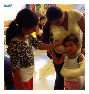 SANDRA helping kids having the same surgery she did.